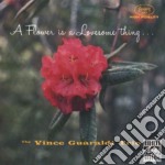Vince Guaraldi Trio - A Flower Is A Lovesome Thi