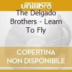 The Delgado Brothers - Learn To Fly cd