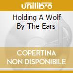 Holding A Wolf By The Ears cd