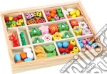Perline in legno nella cassetta giochi