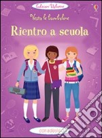 Rientro a scuola. Vesto le bamboline. Con adesivi. Ediz. illustrata libro