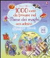 1000 cose da trovare nel paese dei maghi. Con adesivi. Ediz. illustrata libro