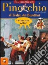 Pinocchio al teatro dei burattini. Con immagini del film di Roberto Benigni libro