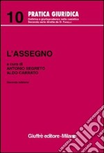 L'assegno. Aggiornata al D. L. 507/99 della L. 18/8/2000 n°235 e del 9/8/2000 n°316 libro