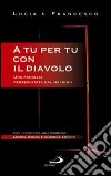 A tu per tu con il diavolo. Una famiglia perseguitata dal maligno libro