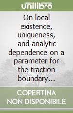 On local existence, uniqueness, and analytic dependence on a parameter for the traction boundary problem in finite elastostatics
