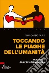 Toccando le piaghe dell'umanità. Esperienze di un frate francescano libro