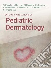 Textbook and atlas of pediatric dermatology libro