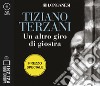 Un altro giro di giostra letto da Edoardo Siravo. Audiolibro. 2 CD Audio formato MP3  di Terzani Tiziano