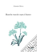 Bianche macule sopra il bianco libro