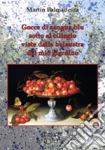 Gocce di sangue blu sotto al ciliegio viste dalla balaustra del mio giardino libro