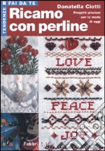 Ricamo con perline libro