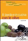A tavola e in cucina con le olive. Ediz. illustrata libro di Caricato Luigi