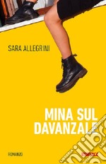 Mina sul davanzale libro