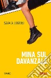 Mina sul davanzale libro