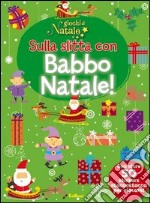 Sulla slitta con Babbo Natale! Giochi di Natale. Con adesivi. Ediz. illustrata libro