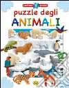 Puzzle degli animali. Ediz. illustrata libro