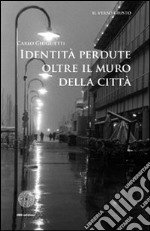 Identità perdute oltre il muro della città libro