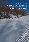 Orme sulla neve color turchese libro