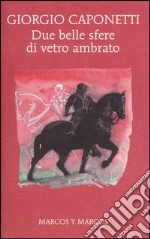 Due belle sfere di vetro ambrato libro