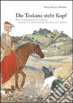 Die Toskana steht Kopf. Ein Schweinschen wirbelt durch ein berühmtes Fresko aus Siena libro