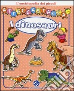 I dinosauri. L'enciclopedia dei piccoli attaccastacca. Con adesivi libro