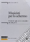 Musicisti per lo schermo. Dizionario ragionato dei compositori cinematografici. Con CD-ROM libro di Comuzio Ermanno