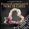 Incantevoli composizioni di fiori di carta libro