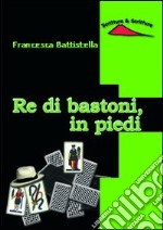 Re di bastoni, in piedi libro