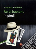 Re di bastoni, in piedi libro