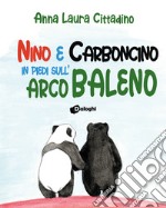 Nino e Carboncino in piedi sull'arcobaleno libro