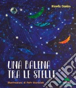 Una balena tra le stelle. Ediz. a colori libro