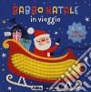 Babbo Natale in viaggio. Il tuo libro grattino. Ediz. a colori libro