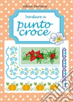 Bordure a punto croce libro