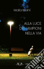 Alla luce dei lampioni nella via libro