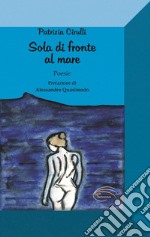 Sola di fronte al mare