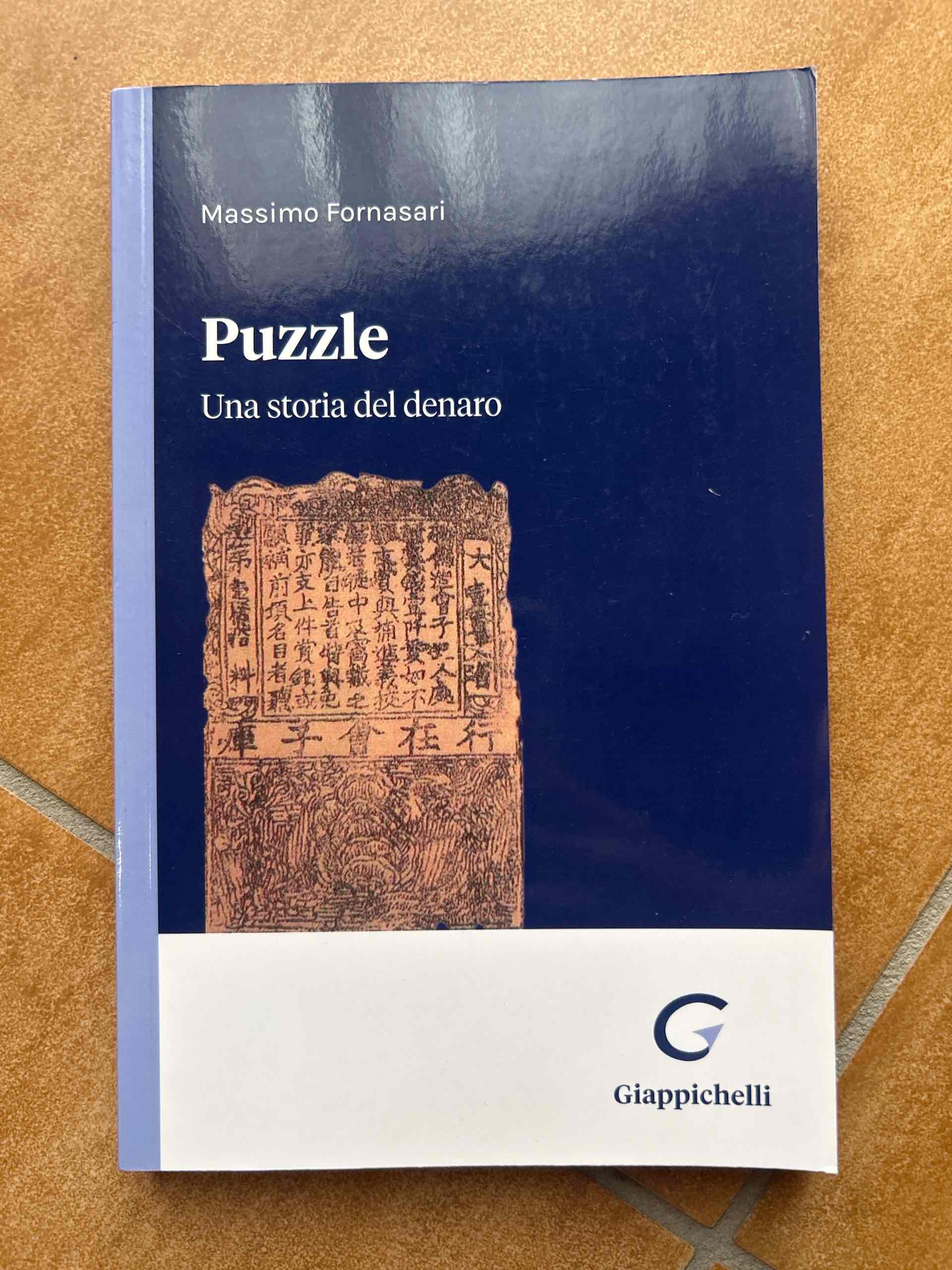 Puzzle. Una storia del denaro libro usato